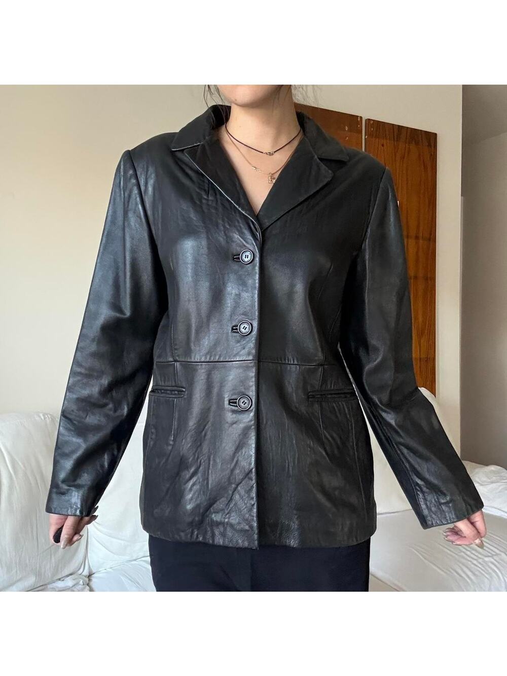 Black leather blazer with button front and pockets